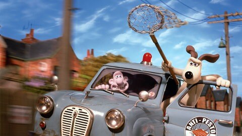 Filmszene Knetfiguren Wallace und Gromit bei Verfolgungsjagd