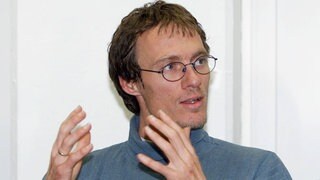 Dieter Baumann sieht sich 1999 dem Vorwurf des Dopings ausgesetzt
