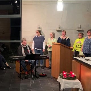 Der Chor "PopCHORn" am muszieren