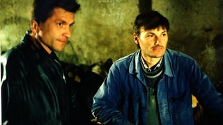 Tierarzt Alex Fehrenbach und Karl im Stall