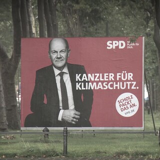 SPD Wahlplakat von 2021, die Aufschrift: Kanzler für Klimaschutz