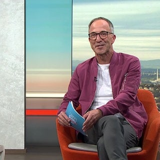 Moderator Jürgen Hörig