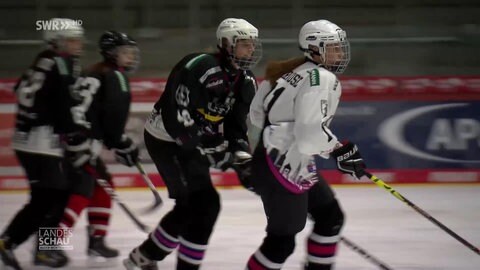 Eishochey Spielerinnen in Ausrüstung