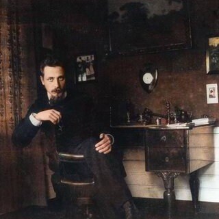 Rainer Maria Rilke in seinem Büro um 1905 – letztes Farbfoto – Spätere Kolorierung.