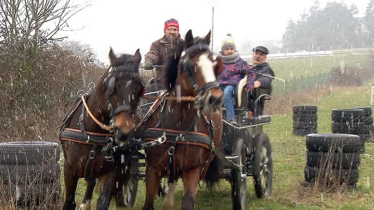 Werner Spitzley mit Enkelin und Sohn Thomas