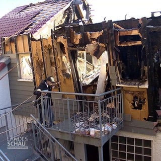 Ein vom Brand zerstörtes Haus