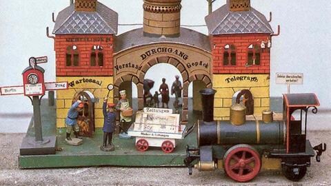 Märklin Blechspielzeugbahnhof mit Lok Storchenbein