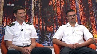 Christian Emrich, Feuerwehrchef aus Freiburg, und Michael Schlegel, ehrenamtlicher Feuerwehrkommandant aus Freiburg-Kappel