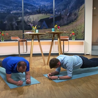 Stephan Müller und Jens Hübschen bei einer Sport Übung
