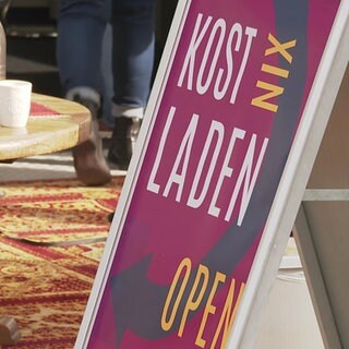Schild Kostnixladen