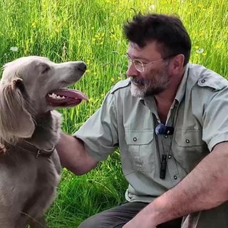 Ralph Steffen zusammen mit seinem Hund Cliff