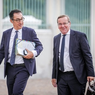 Der heutige baden-württembergische Ministerpräsident Özdemir (links) und Bundesverteidigungsminister Pistorius (Archivbild).