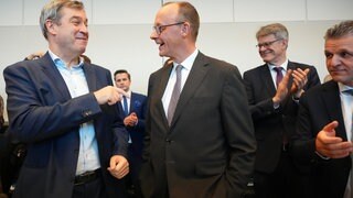 Die neue Herren der Macht: Friedrich Merz, Markus Söder und Thorsten Frei.