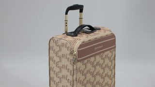 Ein beigefarbener Rollkoffer der Marke "Juicy Couture" in einer Größe von 70 x 46 x 25 cm.