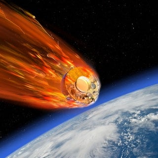 Ein Satellit, der verglüht, während er durch die Erdatmosphäre reist. 