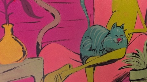 Ausschnitt eines Wandgemäldes vom PFFFestival in Stuttgart: Ein anthropomorpher Finger sitzt mit einer Katze auf dem Schoß auf einem Sessel.