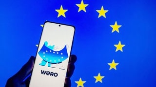 Screenshot der Wero-App mit EU-Flagge: Eine europäische Echtzeit-Zahlungslösung, die Überweisungen innerhalb von 10 Sekunden per Handynummer ermöglicht, wurde von der European Payments Initiative entwickelt als Alternative zu PayPal