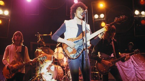 Phil Lynott und Thin Lizzy bei einem Livekonzert.