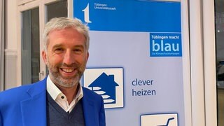 Der Tübinger Oberbürgermeister Boris Palmer lächelt in die Kamera. Trotz schlechter Rahmenbedingungen setzt er weiter auf Klimaschutz.