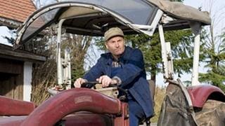 Karl auf seinem Traktor