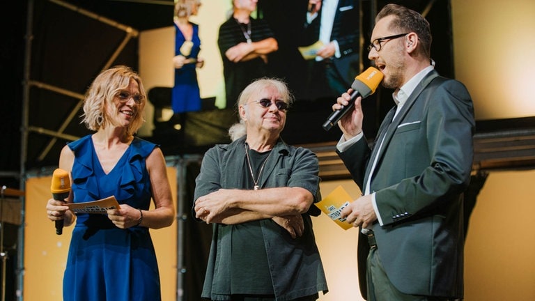 Stefanie Anhalt und Jochen Stöckle mit Ian Paice von Deep Purple
