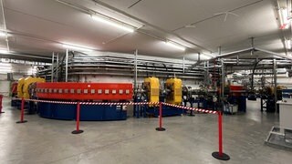In diesem Ringbeschleuniger werden die Ionen auf 200.000 Kilometer pro Sekunde beschleunigt
