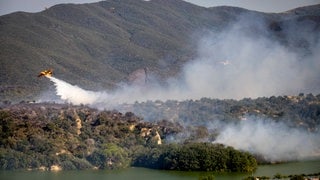 Wildfire In Northern Catalonia, Southern France Firefighters work to contain a major wildfire near Trevillach, in the Pyrenees-Orientales department of Northern Catalonia, southern France, on July 6-7, 2026