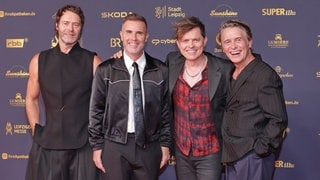Die neue Take-That-Single "Feel My Love" mit Michael Patrick Kelly (2.v.r.) und Howard Donald, Gary Barlow und Mark Owen.