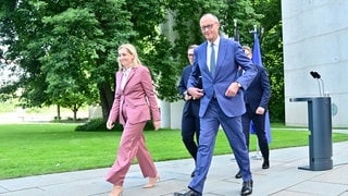 Nina Warken und Bundeskanzler Merz.