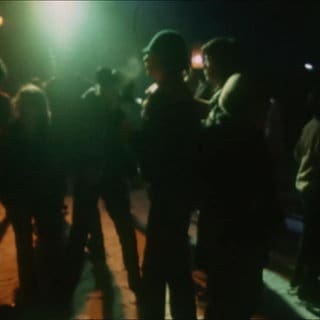 Feiernde in der Eis-Disco