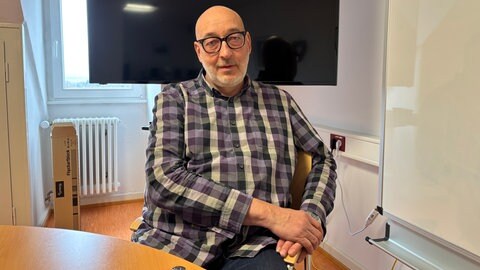 Guido Scherer ist Ortsbürgermeister von Büchenbeuren. In seinem Ort war die AfD bei der EU-Wahl sehr erfolgreich, viele ihrer Wähler waren wohl Russlanddeutsche.
