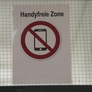 Schild mit Aufschrift "Handyfreie Zone"