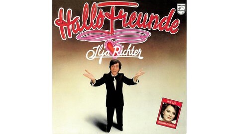 Plattencover von "disco"-Moderator Ilja Richter von "Der Welt erste und einzige Maxe-Flitter-Humpa-Oma-Lila-Beileid-Otto-Joker-Winsen-Sehnsucht-Eiernudel-Platte" mit Marianne Rosenberg. Bekannt wurde Ilja auch durch seine Sketche und die "Pauker"-Filme.