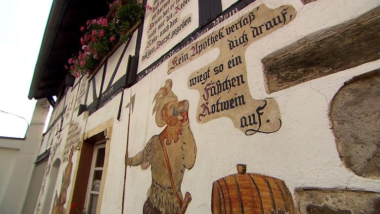 Haus mit Bildern und Texten