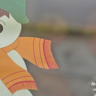 Fensterbild mit Schneemann