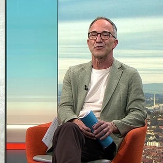 Moderator Jürgen Hörig