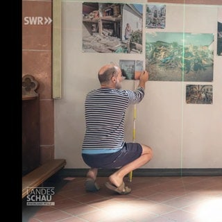 Fotograf Frank Schultze auf einer Fotoausstellung