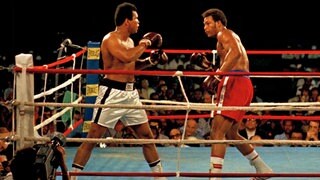 Muhammad Ali, links, während eines Kampfes mit George Foreman
