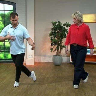 Moderatorin Heike Greis und Fitnesstrainer Florian Michel