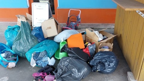 Ein Second-Hand-Laden im Westen der Pfalz im Kampf gegen illegale Müll-Spenden.