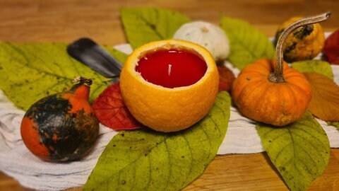 Orangenkerze